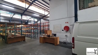Warehouse with good height,high roller shutter entrance situated 24-hour security park in Diep River