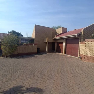 This Townhouse is in a Sought after Complex In a Boomed off Area!