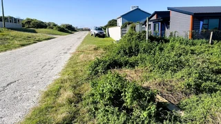 Prime Coastal Plot with Sea Views &amp; Approved Plans – Ready to Build!