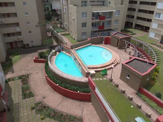 Secure 2 bedroom 1 bathroom apartment for sale in Palm Gate with large patio