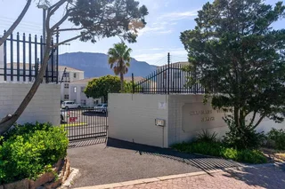 The whole Valley and Constantiaberg Mountains is the sublime view from this sunny renovated apart...