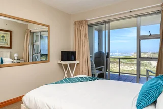 Uninterrupted Views! Walk through the gate onto the beach. Priced for a quick sale!