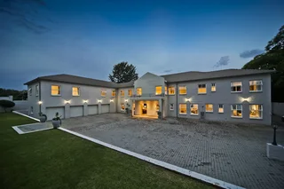 Home with 4 Garages and Tennis Court