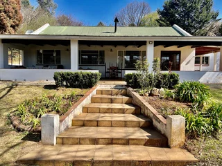 HOME WITH MATURE GARDEN