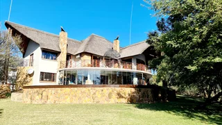 Tranquil Sophistication with Waterfront Views in Leeuwfontein Estate
