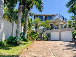 Exquisite 4-Bedroom Family Retreat with Tropical Garden &amp; Ocean Views – Umhlanga Ridge