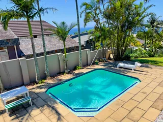 Exquisite 4-Bedroom Family Retreat with Tropical Garden &amp; Ocean Views – Umhlanga Ridge