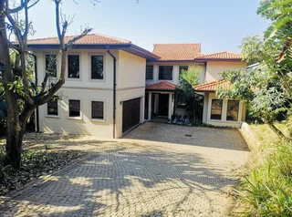 Prime Property Presents Exquisite 5-Bedroom Home with Private Flatlet in Zimbali Estate.