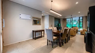 Modern fully furnished 2-bedroom apartment with a private lush garden!