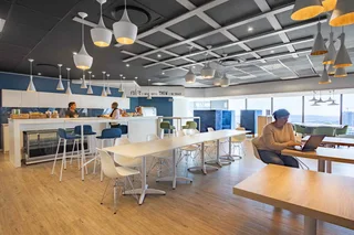 Fully serviced open plan office space for you and your team in Spaces Atrium on 5th Sandton.