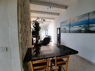 Beachfront Penthouse Living For Sale in Shakas Rock