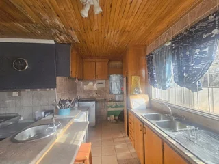 Spacious Four-Bedroom Home with Income Potential and Flatlets