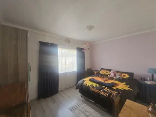 Spacious Four-Bedroom Home with Income Potential and Flatlets