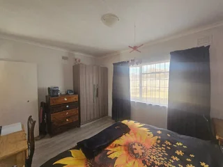 Spacious Four-Bedroom Home with Income Potential and Flatlets