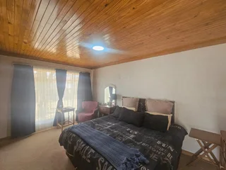 Spacious Four-Bedroom Home with Income Potential and Flatlets