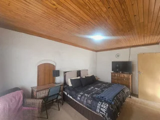 Spacious Four-Bedroom Home with Income Potential and Flatlets