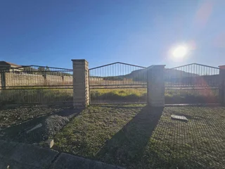 Prime Vacant Land with Stunning Sandstone Wall and Scenic Views