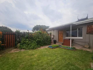 **Charming Two-Bedroom, Two-Bathroom Home with Versatile Living Spaces**