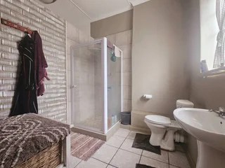 **Charming Two-Bedroom, Two-Bathroom Home with Versatile Living Spaces**