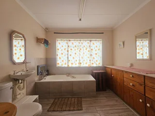 **Charming Two-Bedroom, Two-Bathroom Home with Versatile Living Spaces**