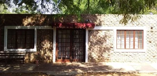 TWO HOUSES .ONE FLATLET. STRONG WATER. THREE LARGE GALVANIZED SHEET STORES. STRONG WATER