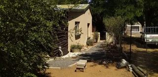 TWO HOUSES .ONE FLATLET. STRONG WATER. THREE LARGE GALVANIZED SHEET STORES. STRONG WATER