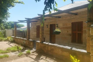 Elegant Sandstone Home with Flair and Family Appeal and a Flatlet