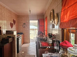 Elegant Sandstone Home with Flair and Family Appeal and a Flatlet