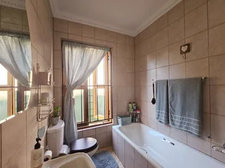 Elegant Sandstone Home with Flair and Family Appeal and a Flatlet