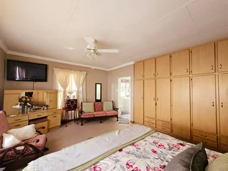 Elegant Sandstone Home with Flair and Family Appeal and a Flatlet