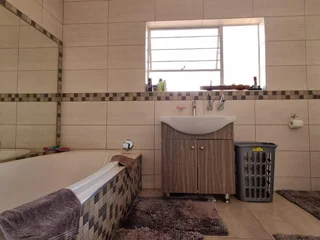 **Charming Three-Bedroom Home with Modern Amenities in Upper Brackenhurst**