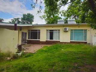 **Spacious 4-Bedroom Property with Immense Potential**