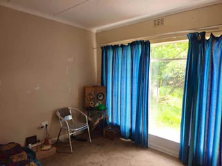 **Spacious 4-Bedroom Property with Immense Potential**