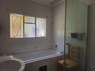 **Spacious 4-Bedroom Property with Immense Potential**