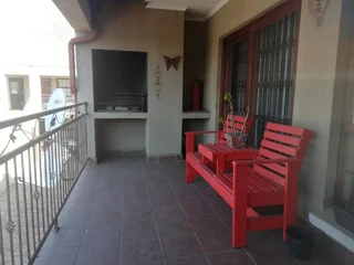 Modern 3 - Bedroom Apartment with Built-in Braai and Communal Swimming Pool!