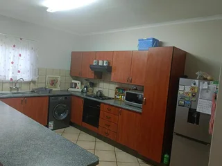 Modern 3 - Bedroom Apartment with Built-in Braai and Communal Swimming Pool!