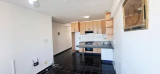 **Exquisite Sectional Title Apartment in Prime North Beach Location**