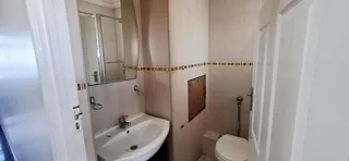 **Exquisite Sectional Title Apartment in Prime North Beach Location**