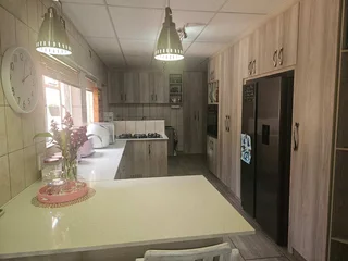 Charming Face-Brick Family Home with Modern Amenities and Exceptional Security