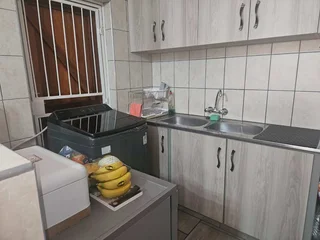 Charming Face-Brick Family Home with Modern Amenities and Exceptional Security