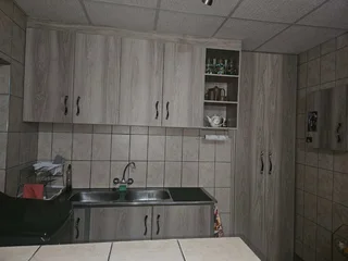 Charming Face-Brick Family Home with Modern Amenities and Exceptional Security