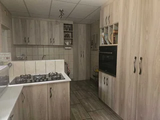 Charming Face-Brick Family Home with Modern Amenities and Exceptional Security