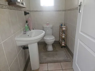 Charming Face-Brick Family Home with Modern Amenities and Exceptional Security