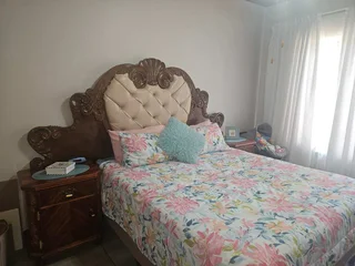 Charming Face-Brick Family Home with Modern Amenities and Exceptional Security