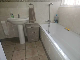 Charming Face-Brick Family Home with Modern Amenities and Exceptional Security