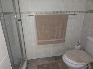 Charming Face-Brick Family Home with Modern Amenities and Exceptional Security