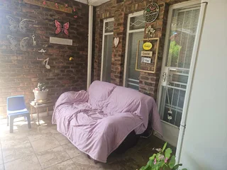 Charming Face-Brick Family Home with Modern Amenities and Exceptional Security