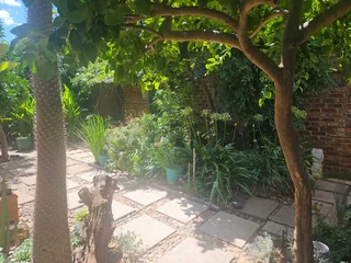 Charming Face-Brick Family Home with Modern Amenities and Exceptional Security