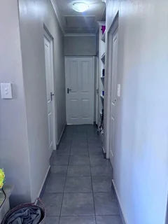 **Spacious 3-Bedroom with build in cupboards in secure community,with added seabreeze***