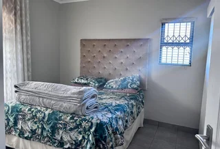 **Spacious 3-Bedroom with build in cupboards in secure community,with added seabreeze***